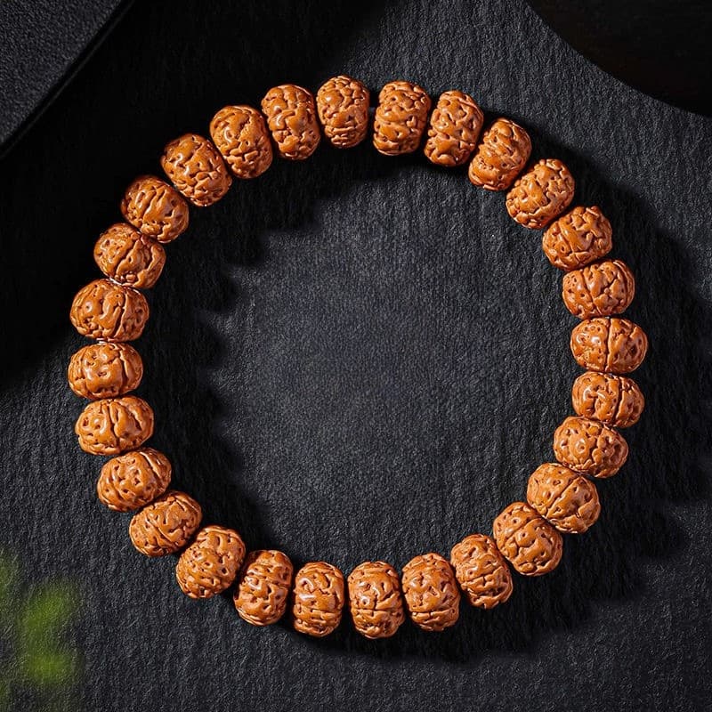 Classic Rudraksha Bodhi bracelet with natural beads on dark stone